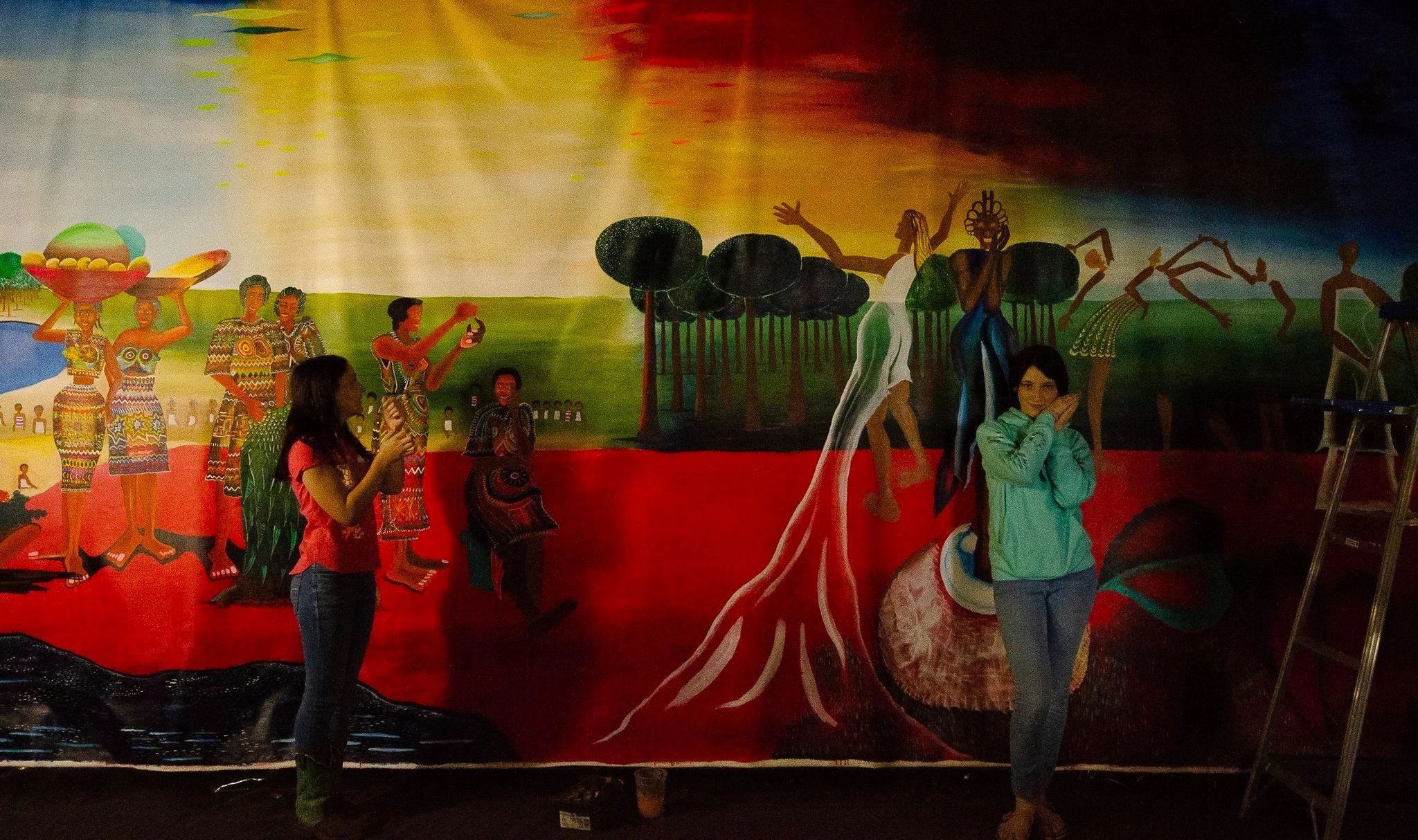 Ibiyinka Alao's monumental painting Eternity stretched across a large interior wall.